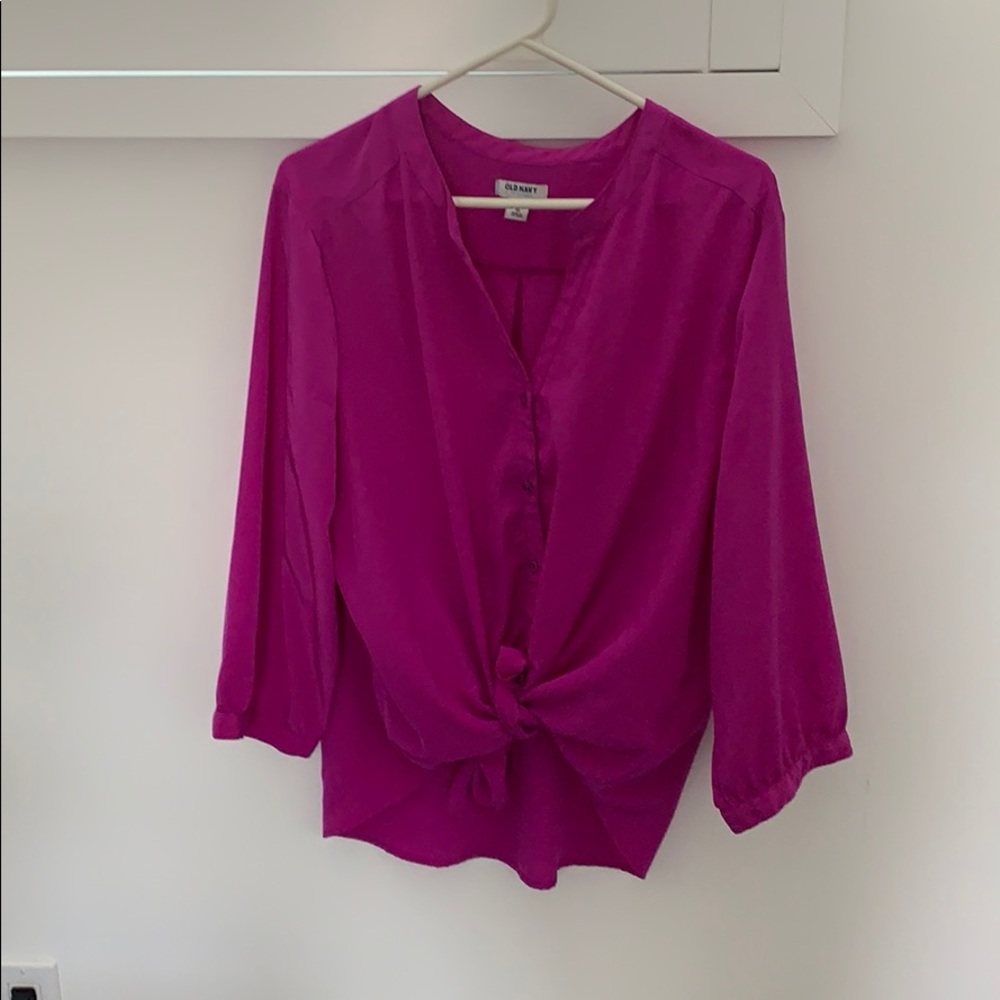 Purple colored button up blouse